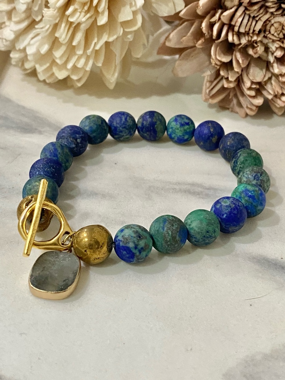 Blue-Green Stone Bead Bracelet with Gold Toggle and Charm